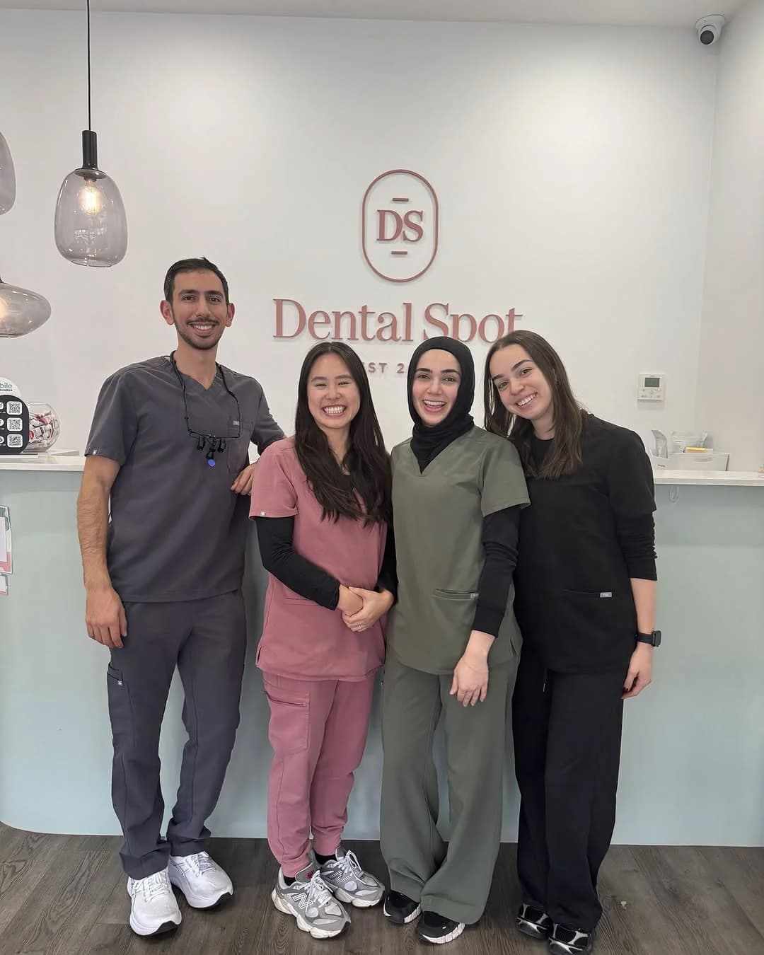 The Dental Spot team together at reception